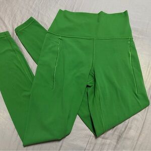 Athleta Transcend Stash Tight leggings green XS